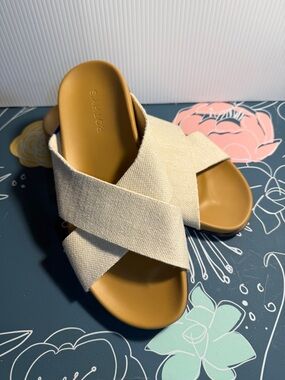 Rothy's Women’s Cream Crossband Slide Sandals with Tan Footbed